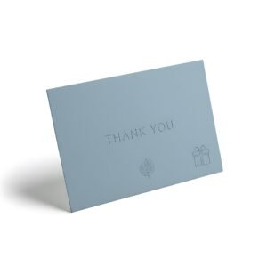 lightbluethankyoucardwithgiftboxandleafillustrationsonawhitebackground.jpg